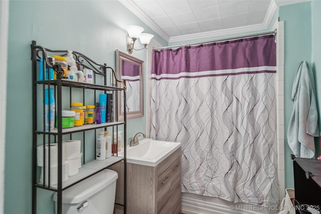 full bathroom with ornamental molding, toilet, shower / bath combo with shower curtain, and vanity