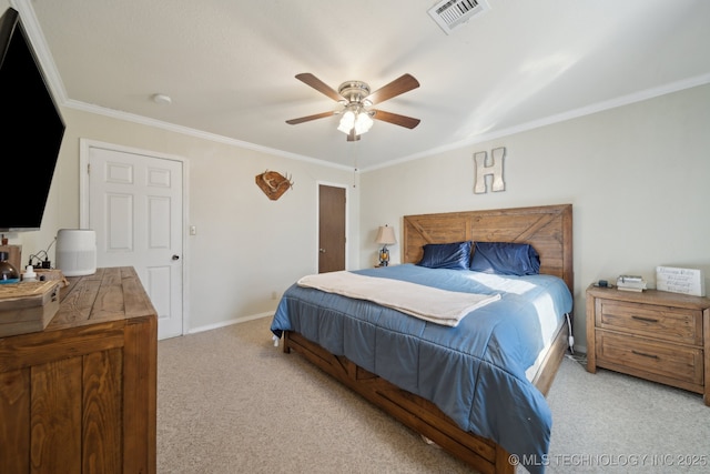 bedroom with crown molding, light colored carpet, and ceiling fan