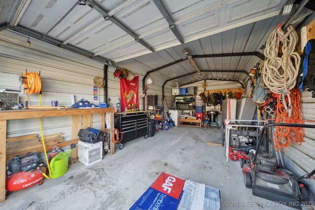 garage featuring a workshop area