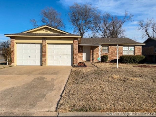 ranch-style home featuring a garage and a front yard