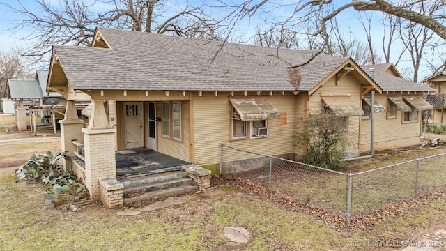 view of front of property featuring cooling unit