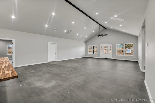 unfurnished living room featuring ceiling fan and high vaulted ceiling