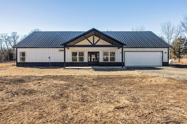 modern farmhouse style home with a garage