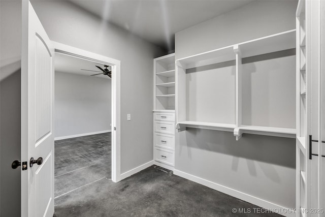 spacious closet featuring ceiling fan