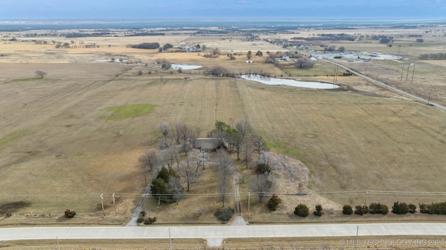 birds eye view of property featuring a rural view