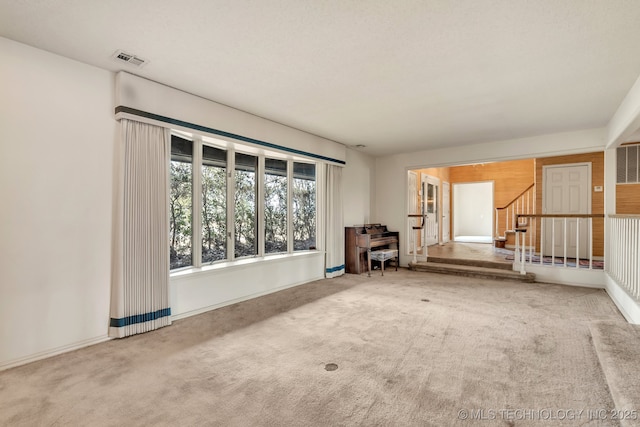 spare room featuring carpet floors