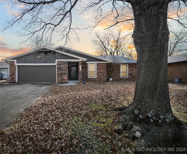 ranch-style home with a garage