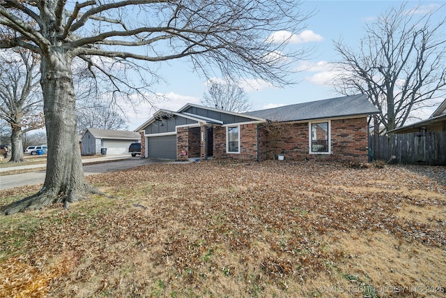 ranch-style home with a garage