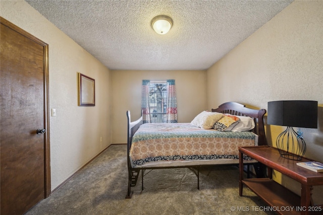 carpeted bedroom with a textured ceiling