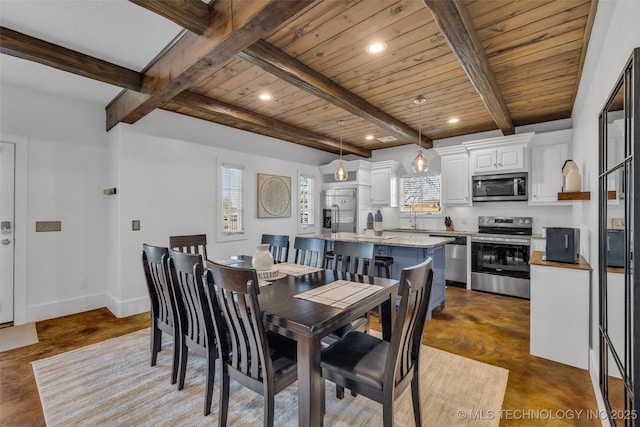 dining area featuring wooden ceiling and beamed ceiling