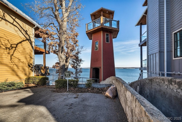 exterior space featuring a water view