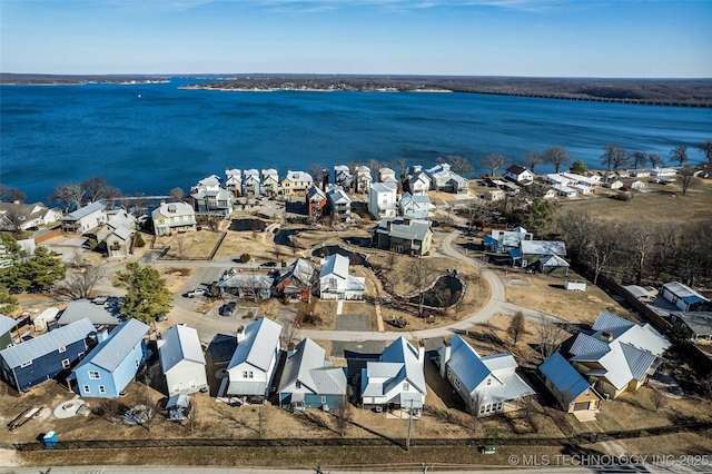 drone / aerial view featuring a water view