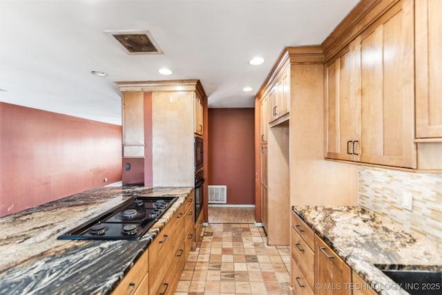 kitchen with visible vents, black appliances, stone countertops, tasteful backsplash, and recessed lighting