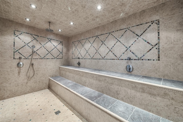 bathroom featuring tiled shower