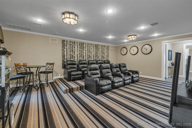 home theater featuring crown molding and carpet flooring