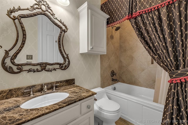 full bathroom featuring vanity, toilet, and shower / bath combo with shower curtain