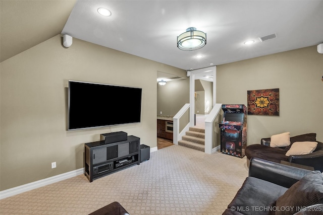 living room featuring vaulted ceiling and light colored carpet