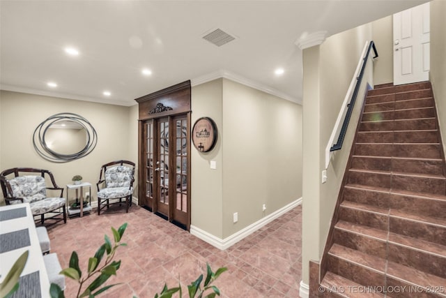 interior space featuring crown molding and french doors