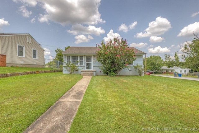 view of front of property with a front lawn