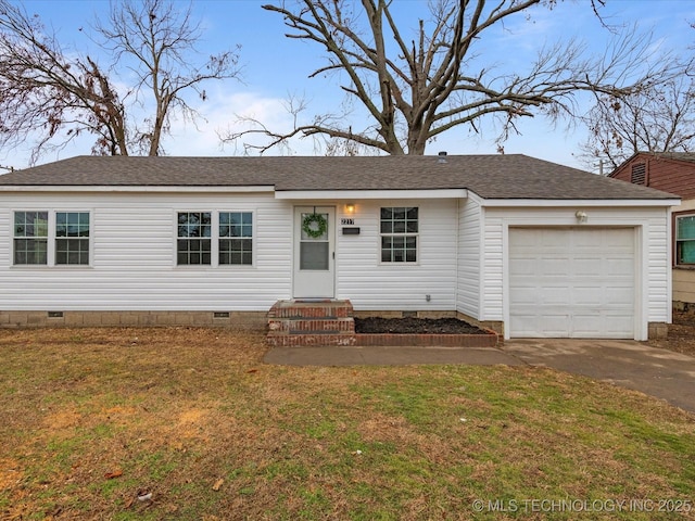 view of front facade featuring a garage and a front lawn