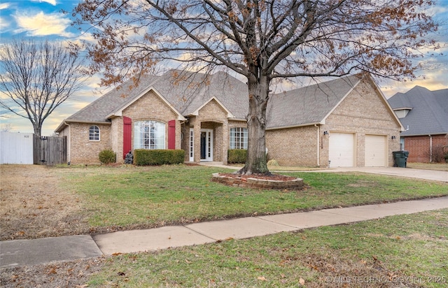 view of front of property with a lawn