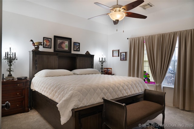 bedroom featuring ceiling fan and light colored carpet