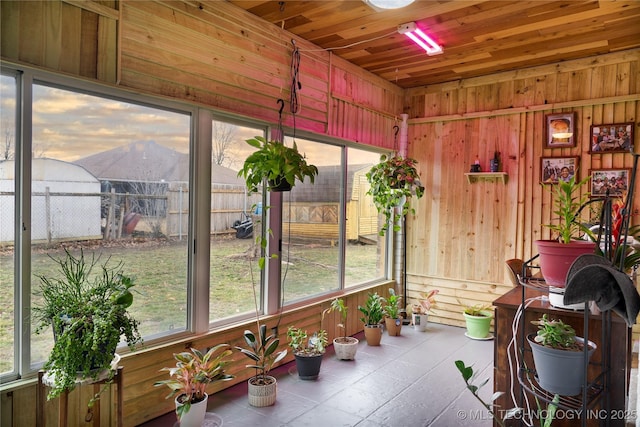 sunroom with wood ceiling