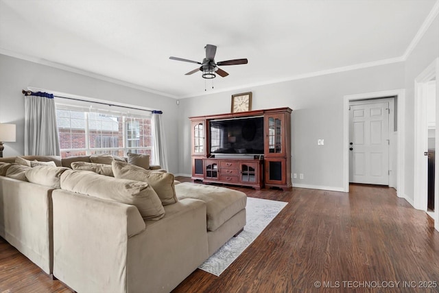 living room with dark wood-type flooring, ceiling fan, and ornamental molding