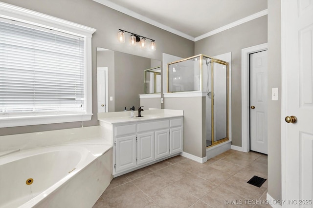 bathroom with ornamental molding, vanity, plus walk in shower, and tile patterned flooring