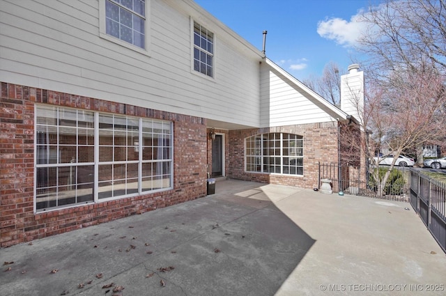 back of house featuring a patio area