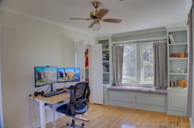 office area featuring crown molding, ceiling fan, and light hardwood / wood-style floors