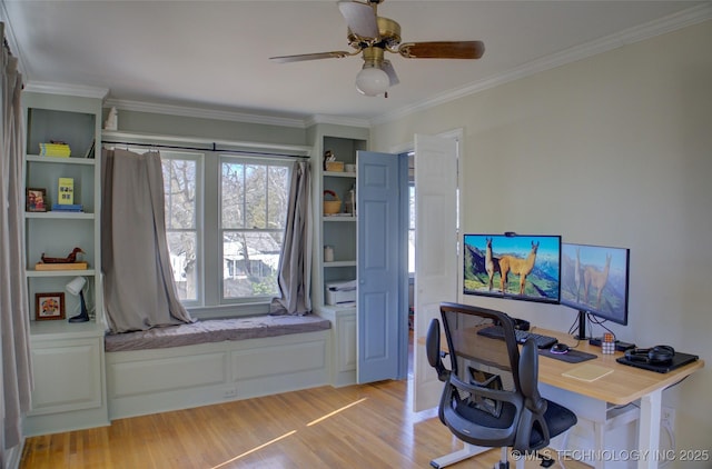 office area with ornamental molding, ceiling fan, and light wood-type flooring