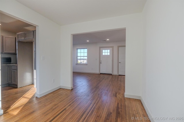 entryway with hardwood / wood-style flooring