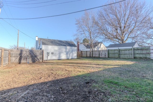 view of yard with a shed