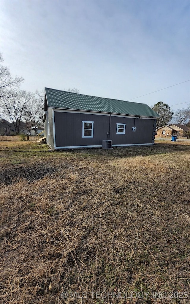 view of front of property featuring cooling unit