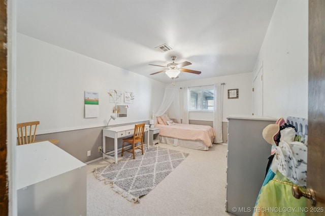 bedroom featuring ceiling fan and carpet floors