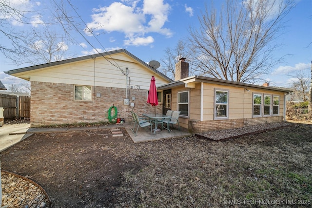 back of house with a patio area