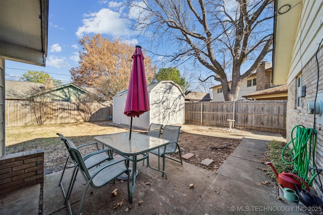 view of patio with a storage shed