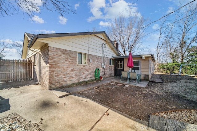 rear view of house with a patio