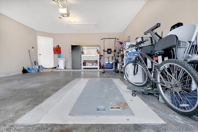 garage featuring a garage door opener