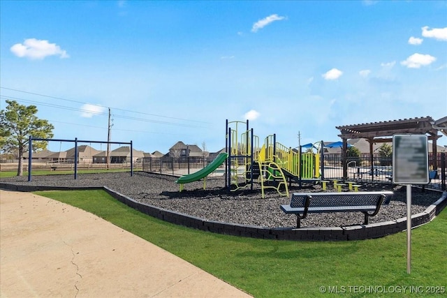 view of play area with a yard and a pergola