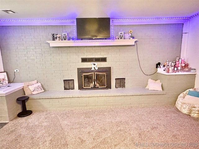 interior space with brick wall and carpet floors