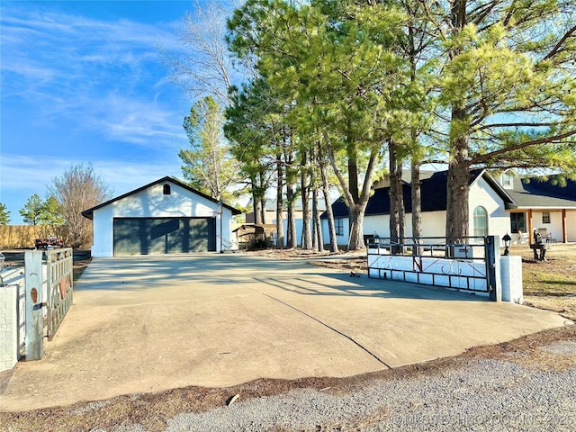 view of front of house with an outbuilding and a garage