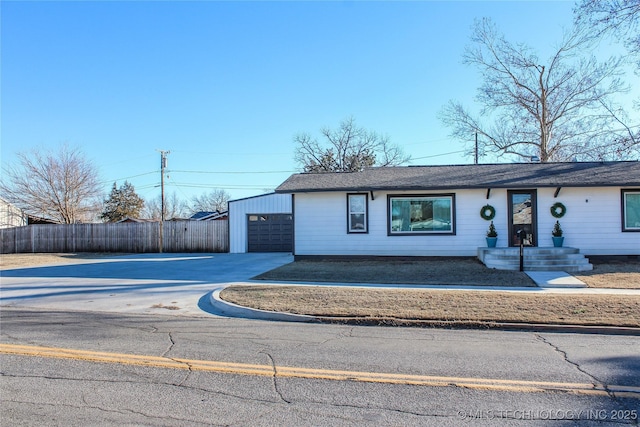 single story home with a garage