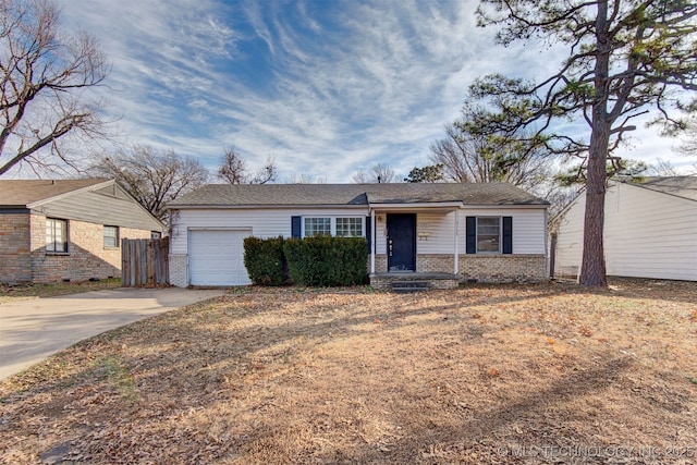 ranch-style home with a garage