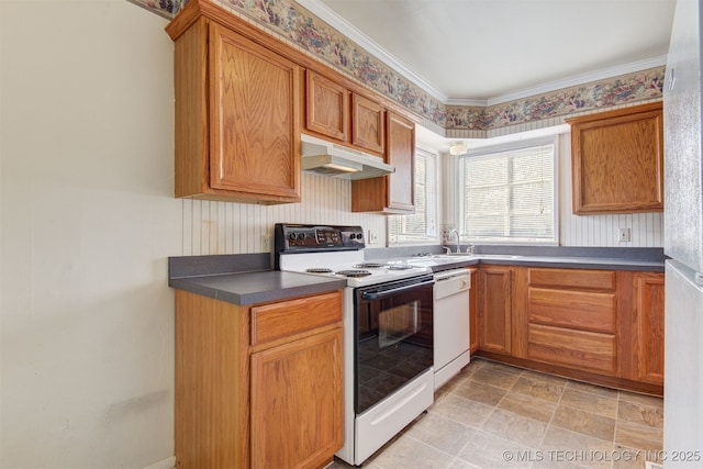 kitchen featuring white appliances and sink