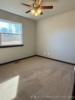 unfurnished room featuring carpet floors and ceiling fan