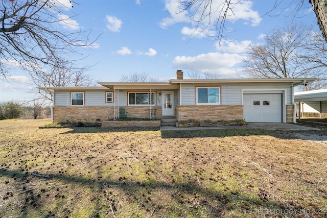 ranch-style house with a garage and a front yard