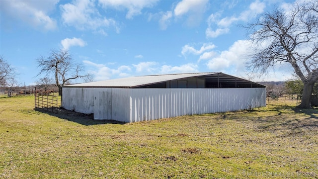 view of outdoor structure featuring a yard