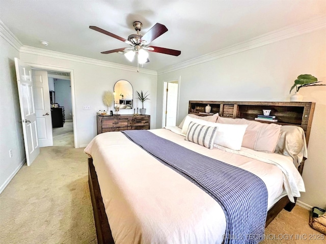 carpeted bedroom featuring crown molding and ceiling fan